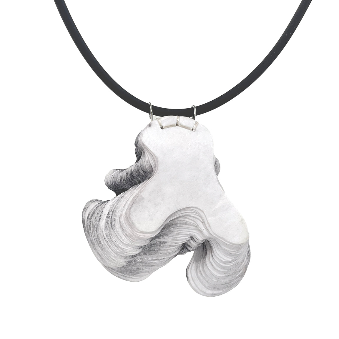 A laser cut stacked paper pendant in gray, with a silicone neck cord and a sterling clasp.