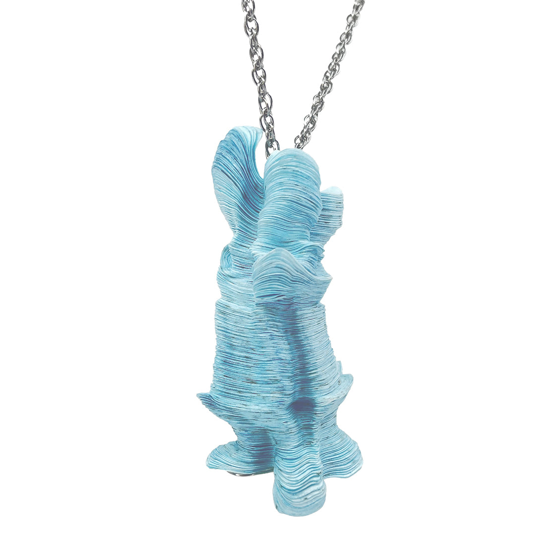 Blue Laser Cut,  Inked, and Stacked Tyvek Pendant Necklace on a Steel Chain