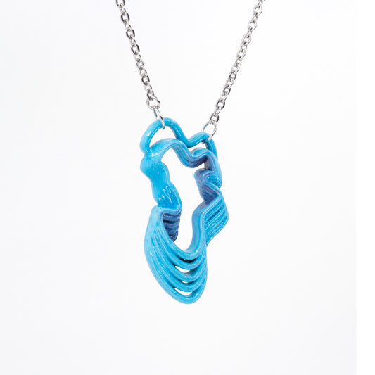 CAD design and 3D printed plastic wave inspired pendant, ink light blue