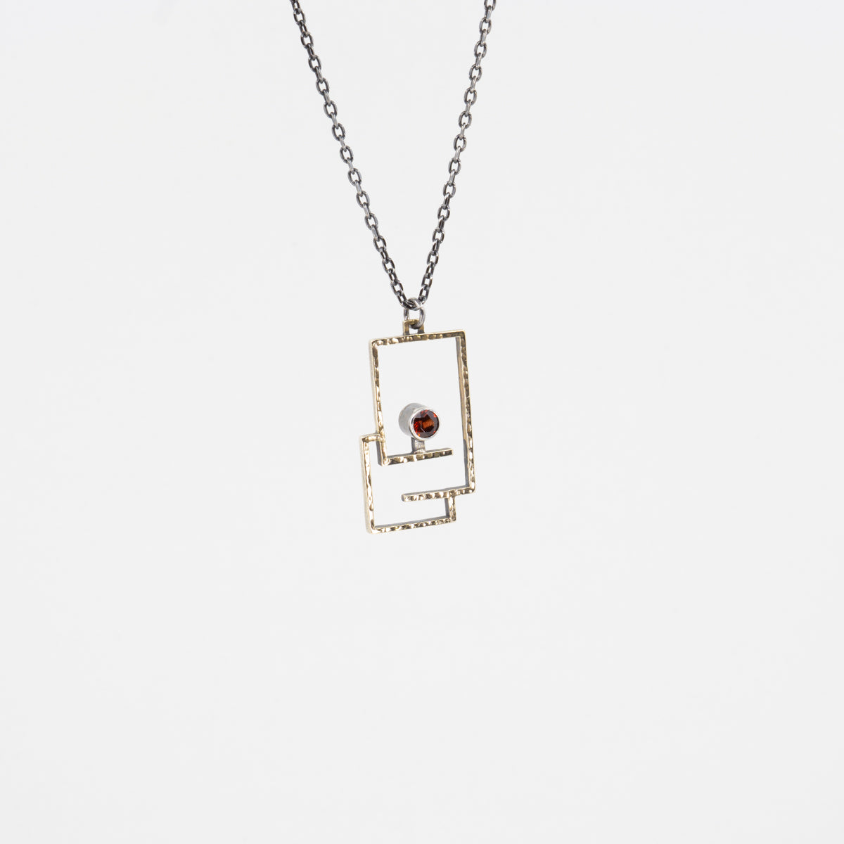 Path Pendant: Brass and Garnet