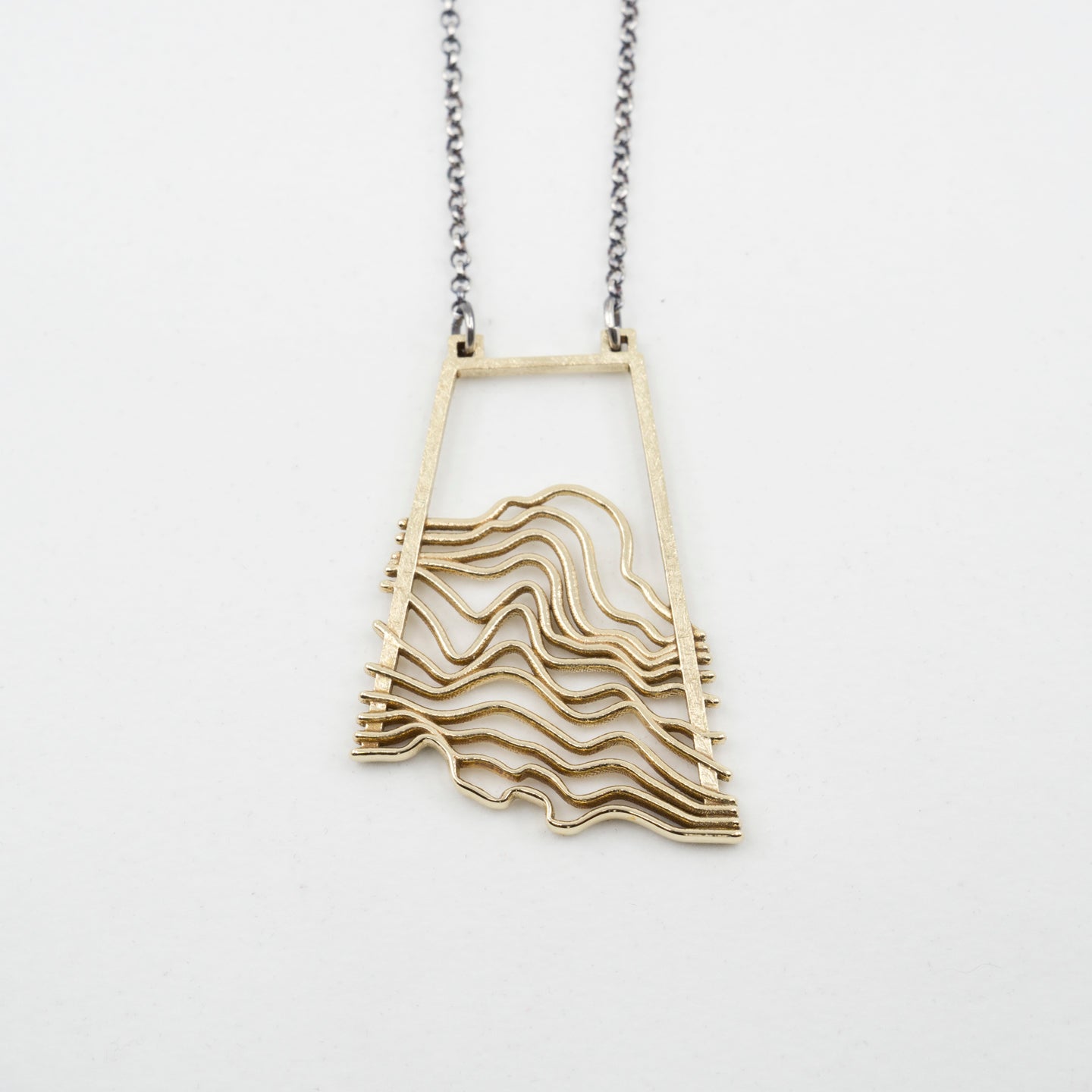 Contour Pendant: Cast Brass